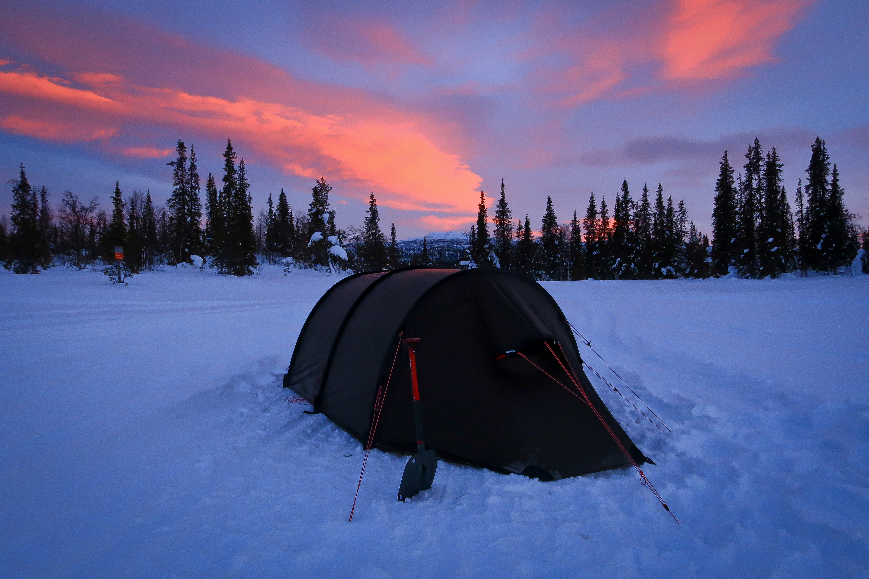 Tent pitched on the only hard snow around